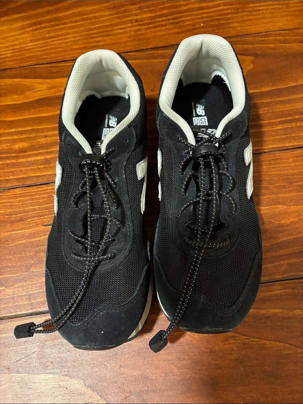 New Balance Men’s Black and White Low-Top Sneakers